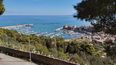 a view of a harbor with boats in the water at Casa Gerani in Castellammare del Golfo