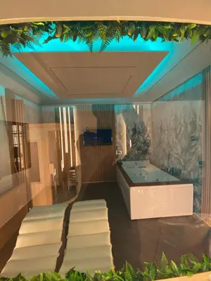 a bathroom with a tub and stairs in it at Cala Sikula Suite &SPA in Palermo