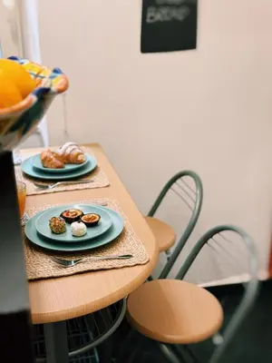 a table with two plates of pastries on it at Quattru Passi in Palermo