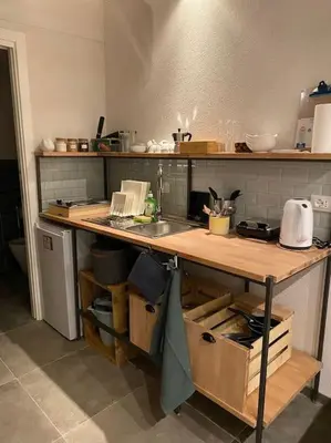 a kitchen with a counter top with a sink at Appartamento Centro Storico in Palermo