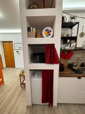 a built in pantry in the kitchen of a house at La Casa di Trudy in Palermo