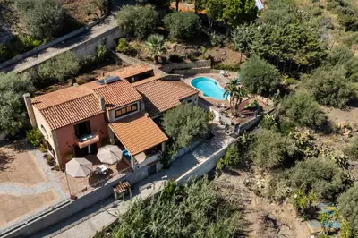 an aerial view of a house with a swimming pool at Verosicily Villa Glicine in Termini Imerese
