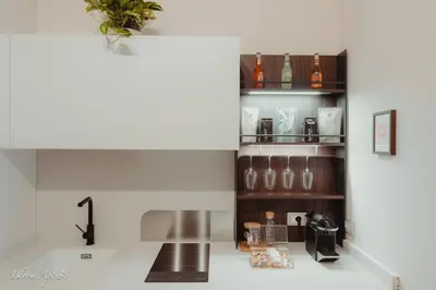 a kitchen with a sink and a counter at Bloom Apartment 35 in Palermo