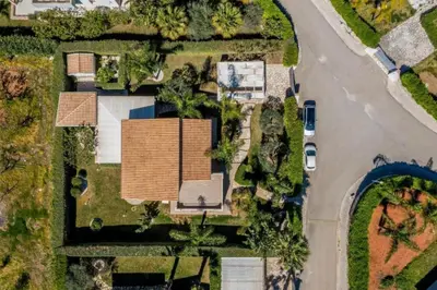 an overhead view of a house with a yard at Borgo Aranci - Villa Nicales in Castellammare del Golfo