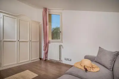 a living room with a couch and a window at Borgo Aranci - Villa Nicales in Castellammare del Golfo