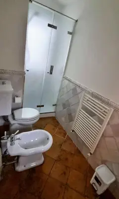 a bathroom with a toilet and a sink at Casale di Sicilia in Monreale