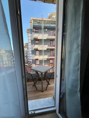 a view from a window of a table and a building at Casa Miriam 281 in Palermo
