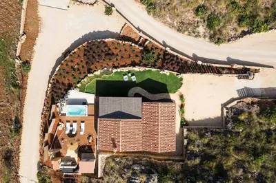 an overhead view of a house with a building at Villa Zingaro Cala Bianca in Castellammare del Golfo