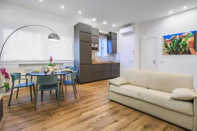 a living room with a couch and a table at Merlo5 in Palermo