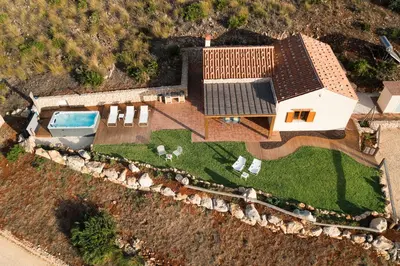 an aerial view of a house with a swimming pool at Villa Ancora Cala Bianca in Castellammare del Golfo