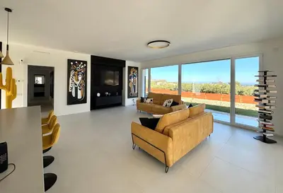 a living room with two couches and a large window at Villa Nanni Contemporary, Pool and Garden in Castellammare del Golfo
