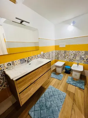 a bathroom with a sink and a toilet at Casa Vacanze di Maria in Palermo