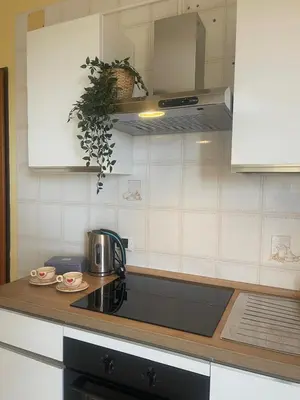 a kitchen with a counter top with a coffee maker at Sicily Holiday Home in Termini Imerese
