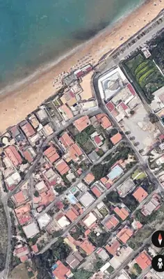 an aerial view of houses on a beach at Perla del Mare in Trappeto