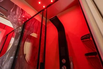 a red room with a window on a train at D'ossuna66 Aquarium in Palermo