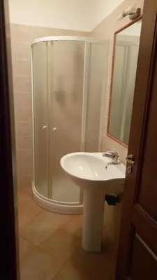 a bathroom with a shower and a sink at Oasi del Sole - sun and sea -Casa Colombo in San Vito lo Capo