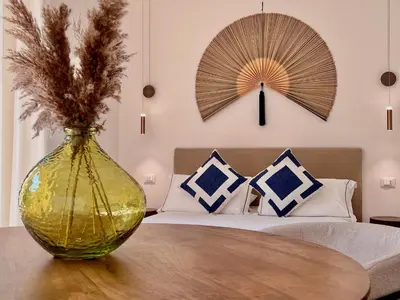 a bathroom with a toilet and a sink at Villa di Nera boutique villa in Palermo