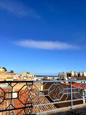 a painting of a train on the tracks at Casa di Sylwia in Termini Imerese