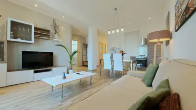 a living room with a couch and a table at Amedeo Suite - Palermo Centro in Palermo