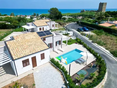 an aerial view of a house with a swimming pool at Villa Lilia - Private pool in Campofelice di Roccella