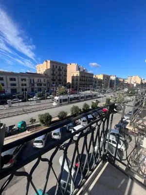 a view of a city with cars parked on a street at Mediterranea sole in Palermo