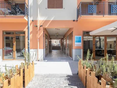 a corridor of a building with potted plants at Apartment Pirandello by Interhome in Balestrate