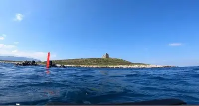 a group of people on an island in the water at Finestra del mare in Isola delle Femmine