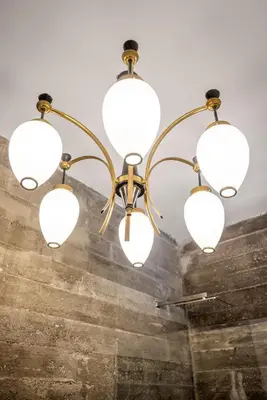 a chandelier hanging from a ceiling in a room at Blu House in Terrasini