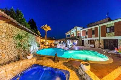 a swimming pool in the middle of a house at Villa Aversa in Castellammare del Golfo