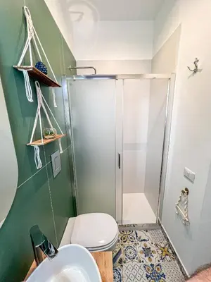 a bathroom with a shower and a toilet at B&B Il Mare di Terrasini in Terrasini
