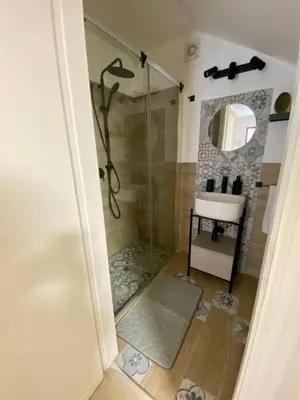 a bathroom with a shower and a sink at La mia Casetta al Politeama in Palermo