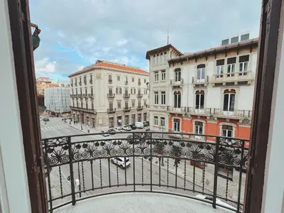a view of a city from a balcony at Candalù - Palermo Suite in Palermo