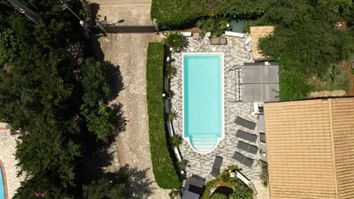 an overhead view of a swimming pool in a yard at Gulliver's Nest in Castellammare del Golfo