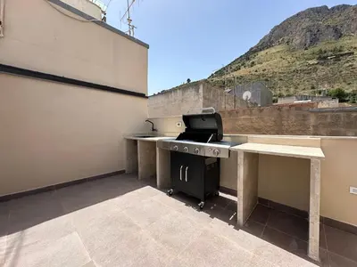a couch sitting on top of a roof at Gs Vacantion's del Golfo con vasca idromassaggio in Castellammare del Golfo