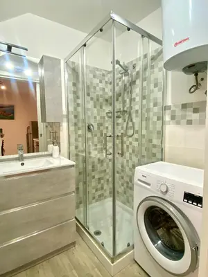 a bathroom with a toilet and a sink at Gs Vacantion's del Golfo con vasca idromassaggio in Castellammare del Golfo
