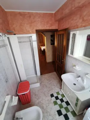 a bathroom with a sink and a toilet and a shower at Località Cefalù - Villa indipendente con giardino in Lascari