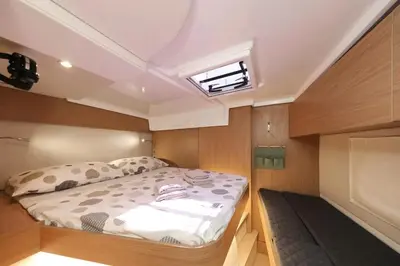 a bed in a small room in a boat at Sicily by Catamaran in Palermo