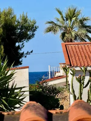 a view of the ocean from a house at Villa Pino in Carini