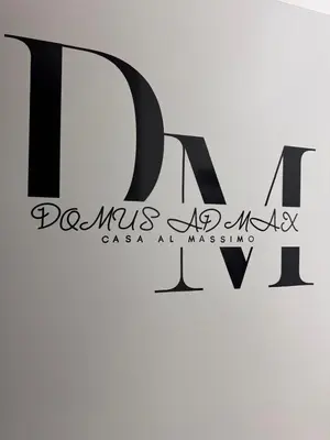 a logo for a cosmetics company called ma massaan at Domus ad Max- La casa nel cuore di Palermo in Palermo