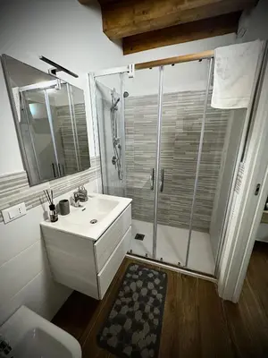 a bathroom with a shower and a sink and a toilet at Il carrettiere in Termini Imerese