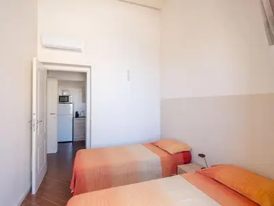 a kitchen counter with a coffee maker and a toaster at Apartment in Villa Storica Lanterna sul Mare Palermo in Palermo