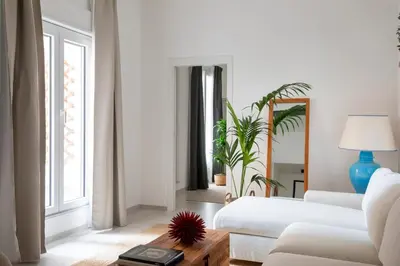 a living room with a couch and a table at With love, Apartment 4 in Palermo