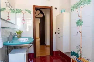 a bathroom with a sink and a mirror at LuminArt in Nuova Gibellina