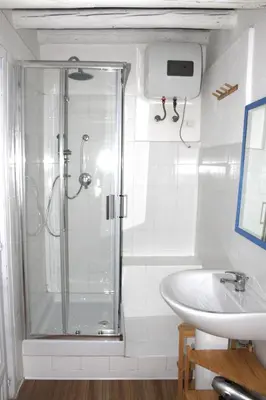a bathroom with a shower and a sink at Eli's Home in Terrasini