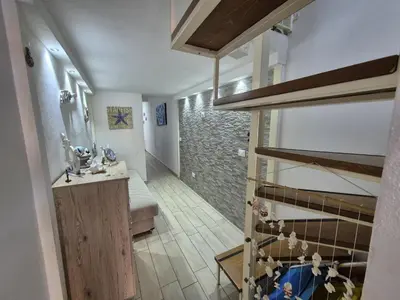a bathroom with a sink and a shower in a room at Ad 1 passo dal mare Mondello in Palermo