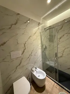 a bathroom with a sink and a shower and a toilet at I Saraceni Cattedrale in Palermo
