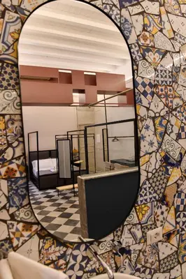 a mirror reflection of a dressing room in a bathroom at Mamamia #Teatro Biondo in Palermo