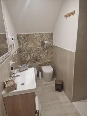 a bathroom with a sink and a toilet at Love is in the air in Palermo