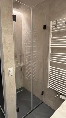a shower with a glass door in a bathroom at Casa delle Maioliche in Palermo