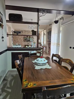 a wooden table with a bowl on it in a kitchen at La Casa Di Ady in Palermo